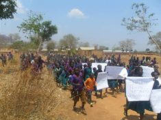 pupils at mbawa school march