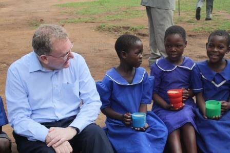 Secretary of State Mundell with pupils from Phuti Primary School on his recent visit to Malawi