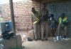 Malawi Police officers drinking beer