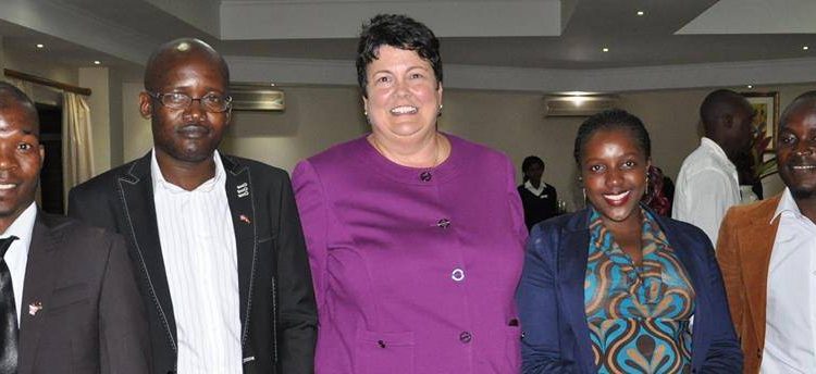 US Ambassador with the four Malawians