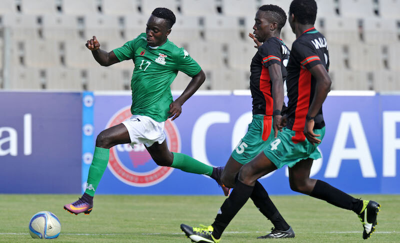 Kenneth Kalunga of Zambia challenged by Francisco Madinga of Malawi during the 2016 Cosafa U20 Youth Championship match between Zambia and Malawi at Moruleng Stadium, Rusternburg  South Africa on 11 December 2016 ©Muzi Ntombela/BackpagePix