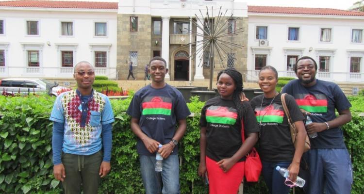 IMCS Malawi Delegation in Malawi Flag T-shirts and a South Afrocan Student (L)-Picture Courtesy of Sidonia Dzikolidaya (ECM)