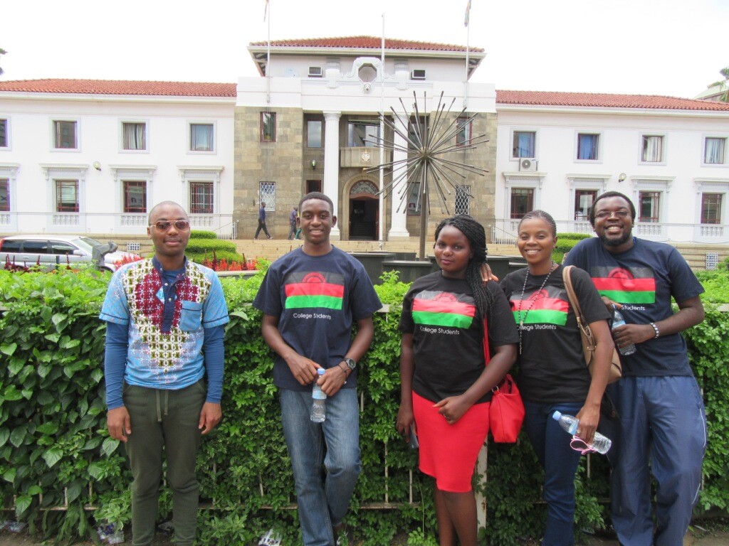IMCS Malawi Delegation in Malawi Flag T-shirts and a South Afrocan Student (L)-Picture Courtesy of Sidonia Dzikolidaya (ECM)