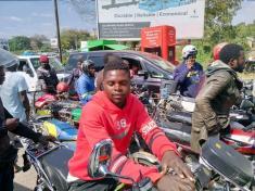 Motorists and motorcyclists queue for fuel in Malawi