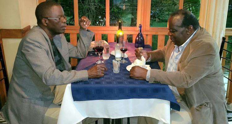 Ken Lipenga and Goodall Gondwe, two former Malawi Finance ministers, sharing a glass of wine.