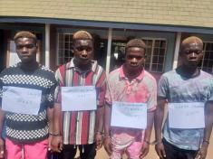 Police in Lilongwe arrest four men for jumping into a moving vehicle to steal Grocery items.