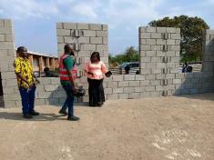 Nancy Chaola Mdooko deputy visiting a classroom Construction project at Dzenza Community Day Secondary School (CDSS)