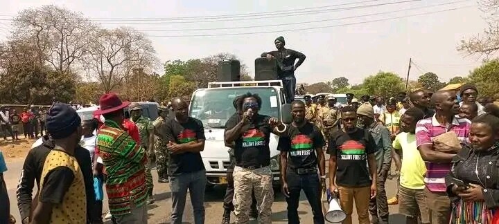 Bon Kalindo (in Khaki trouser) leading anti-government protesters