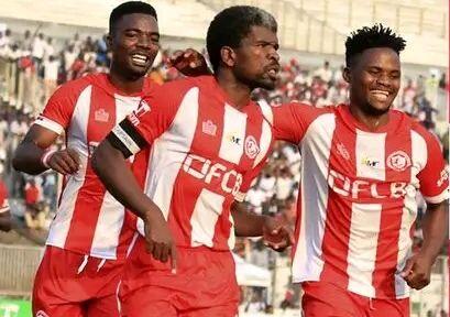 Fodya (C) celebrating a goal for Nyasa Big Bullets in a Super League game against Tigers