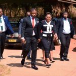 Prophet Shepherd Bushiri and Wife Mary Bushiri Walking Through a Crowd of People