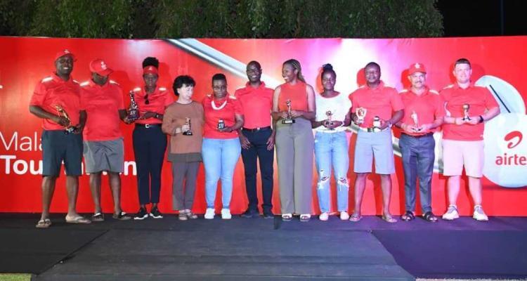 Winners of the Airtel Golf Tourney pose for a group photo with Airtel Official