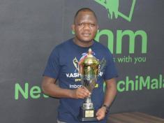 TNM’s Head of Internal Audit department Ackson Banda pose with award for Internal Audit Awareness Champion