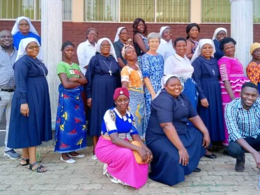 Catholic church sisters pose with Cyclone Freddy survivors