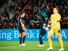 Tabitha Chawinga (C) features for Paris Saint Germain in a UEFA Women's Champions League game against Manchester United