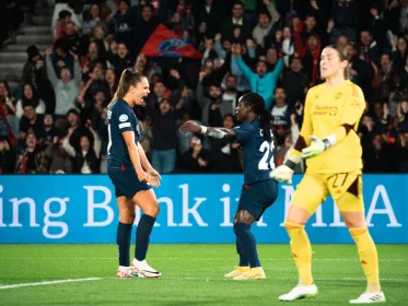 Tabitha Chawinga (C) features for Paris Saint Germain in a UEFA Women's Champions League game against Manchester United