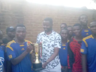 James Mpunga with the winning team in the James Mpunga trophy