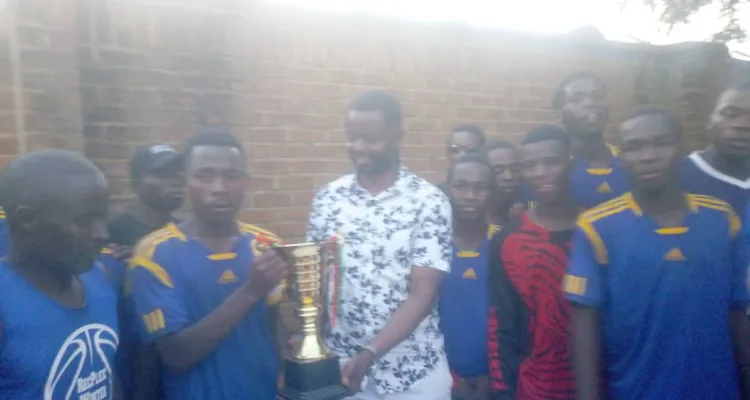 James Mpunga with the winning team in the James Mpunga trophy