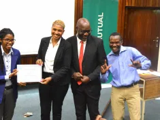 on Saturday October 28, 2023, over twenty frontline staff from all Old Mutual Malawi branches across the country, received certificates after completing a two-month training in sign language.
