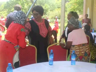 Malawi First Lady Monica Chakwera in Mangochi with elderly women in December 2023