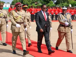 Lazarus Chakwera walking on carpets at Kamuzu International Airport