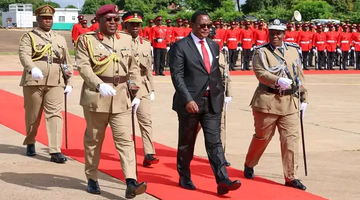 Lazarus Chakwera walking on carpets at Kamuzu International Airport