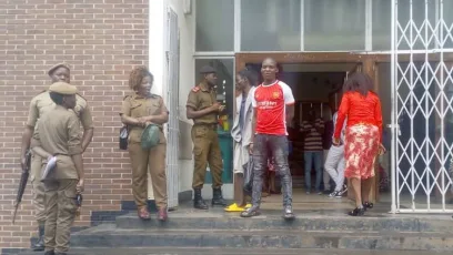 A herbalist (in red jersey) after being sentenced