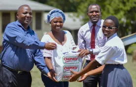 Age Africa donates assorted items to bursary beneficiaries at Masongola Secondary School