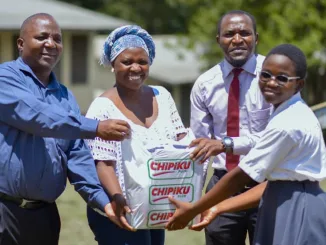 Age Africa donates assorted items to bursary beneficiaries at Masongola Secondary School