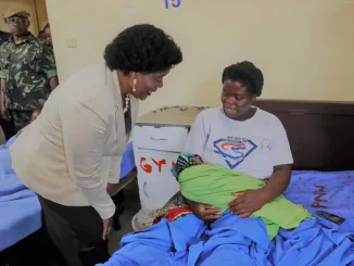 First Lady Monica Chakwera with a mother and her newborn at Mzuzu Hospital in March, 2024