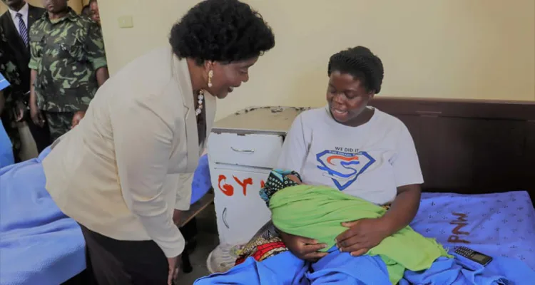 First Lady Monica Chakwera with a mother and her newborn at Mzuzu Hospital in March, 2024