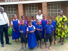 A teacher at Mulunguzi Primary School in Zomba, Mukire Rachel Mhango, has donated school uniform to 20 needy students to encourage them to remain in school to concentrate on their education.