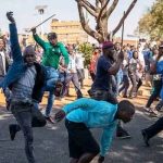 Protesters in South Africa demonstrate against xenophobic attacks targeting Malawians.