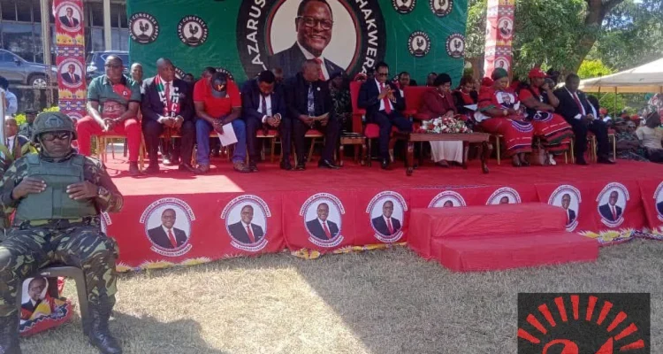 MCP supporters at the Kamuzu Day parallel rally in Lilongwe Malawi on May 14 2026 in front of a podium decorated with Lazarus Chakwera's face rather than Kamuzu Banda's with all attendants wearing Chakwera party attire and no Kamuzu regalia in sight
