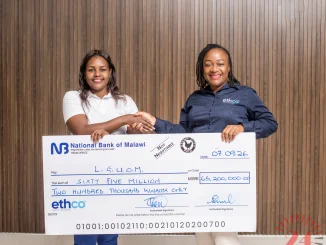 Chakaniza Right Hands Over The Dummy Cheque To Sibale- Malawi24
