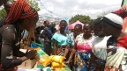 Farmers Lookingat The Products- Malawi24