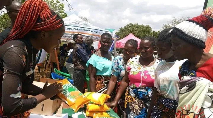 Farmers Lookingat The Products- Malawi24