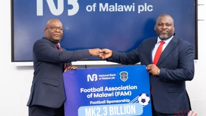Katsalaleft Handing The Dummy Cheque To Haiya 002- Malawi24