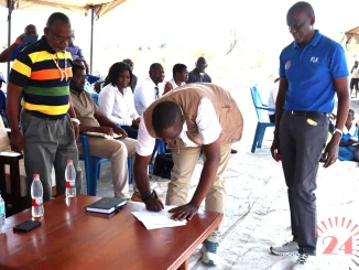 Mpulukacentre Signing Off The Land Deal Alongside Senior Ta Tengani Left And Kasaila Right 002- Malawi24