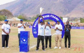 Chigwenembe Lifts A Trophy As Nbm Plc And Fam Delegates Look On 002- Malawi24