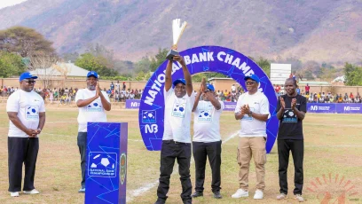 Chigwenembe Lifts A Trophy As Nbm Plc And Fam Delegates Look On 002- Malawi24