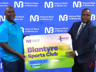 Masi Right Handing Over The Symbolic Cheque To Nkhata 002- Malawi24