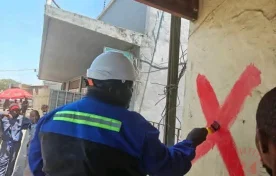 Osman Painting One Of The Buildings- Malawi24