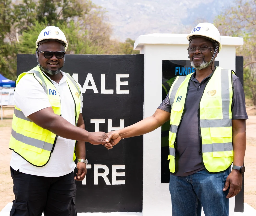 Ulaya Left Shakes Hands With Chirwa After The Groundbreaking Ceremony 002- Malawi24