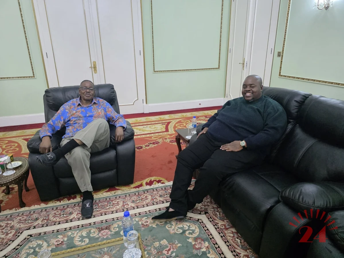 Wicknell Chivayo with Peter Mutharika